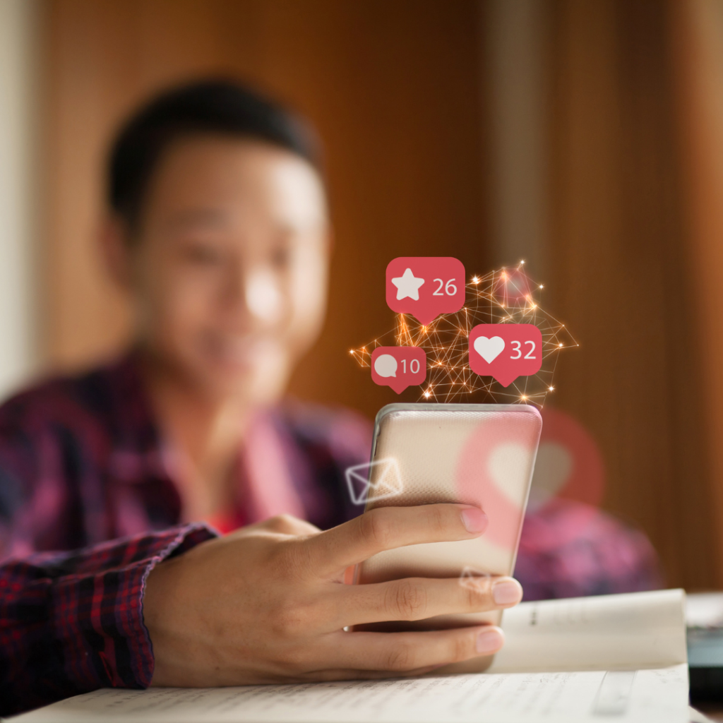 Smartphone with metrics showing high engagement analytics for social media marketing campaign.